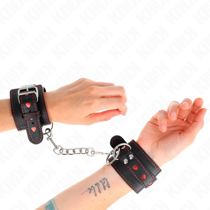 KINK - APPUI-POIGNETS NOIR AVEC INCRUSTATION COEUR ROUGE RÉGLABLE 21-28 CM X 5,5 CM KINK WRIST RESTRAINT