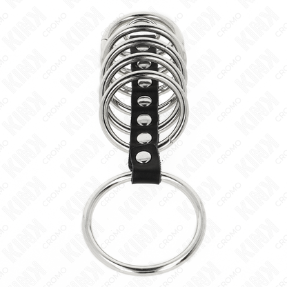 KINK - 7 ANNEAUX PÉNIS EN MÉTAL DE 3,2 CM À 5 CM CONNECTÉS PAR DU CUIR KINK RING POWER
